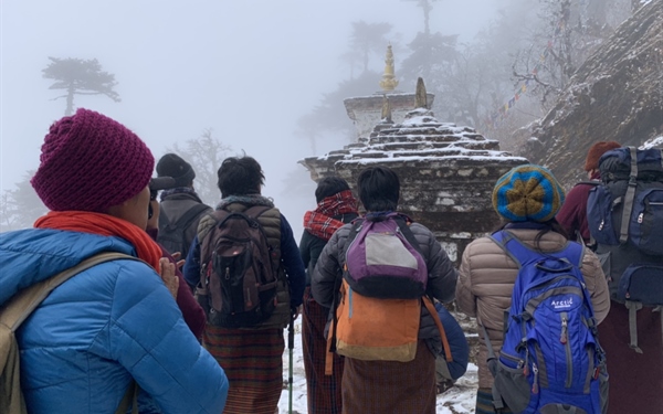 Pilgrims queuing at Aja Nye sacred cave – a must-see site featured in the Mongar Bhutan travel guide
