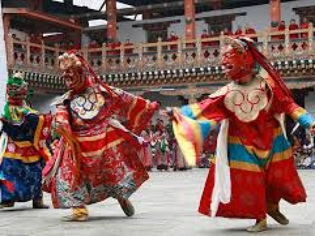 Masked dancers at Nalakhar Tshechu Festival in Bumthang